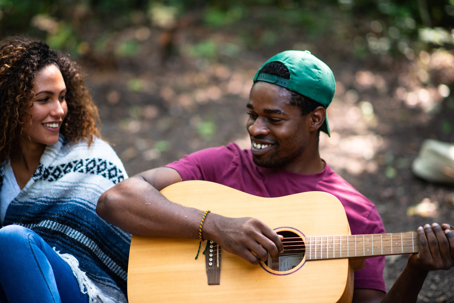 Multi-Ethnic Campfire Sing-A-Long stock photo